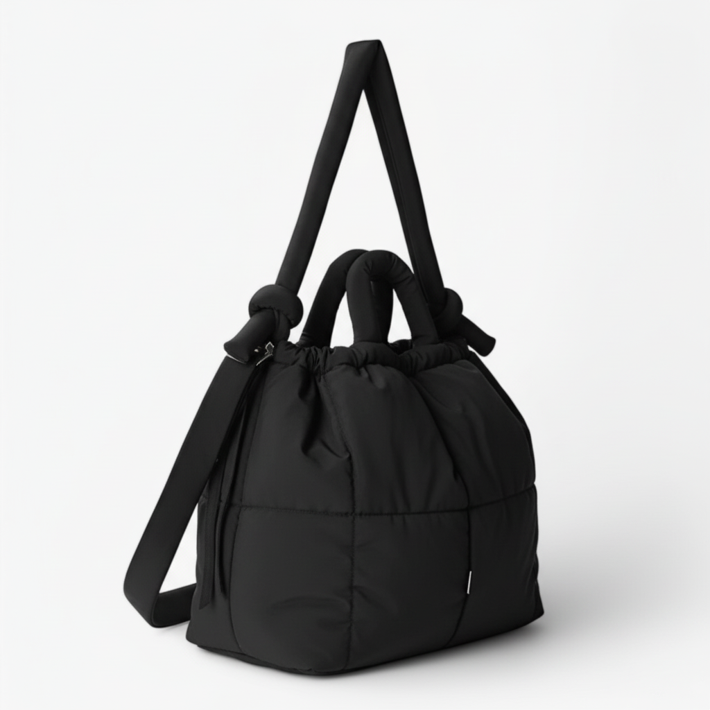 Dark grey quilted puffer bag side view