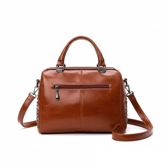 Brown leather bag back view